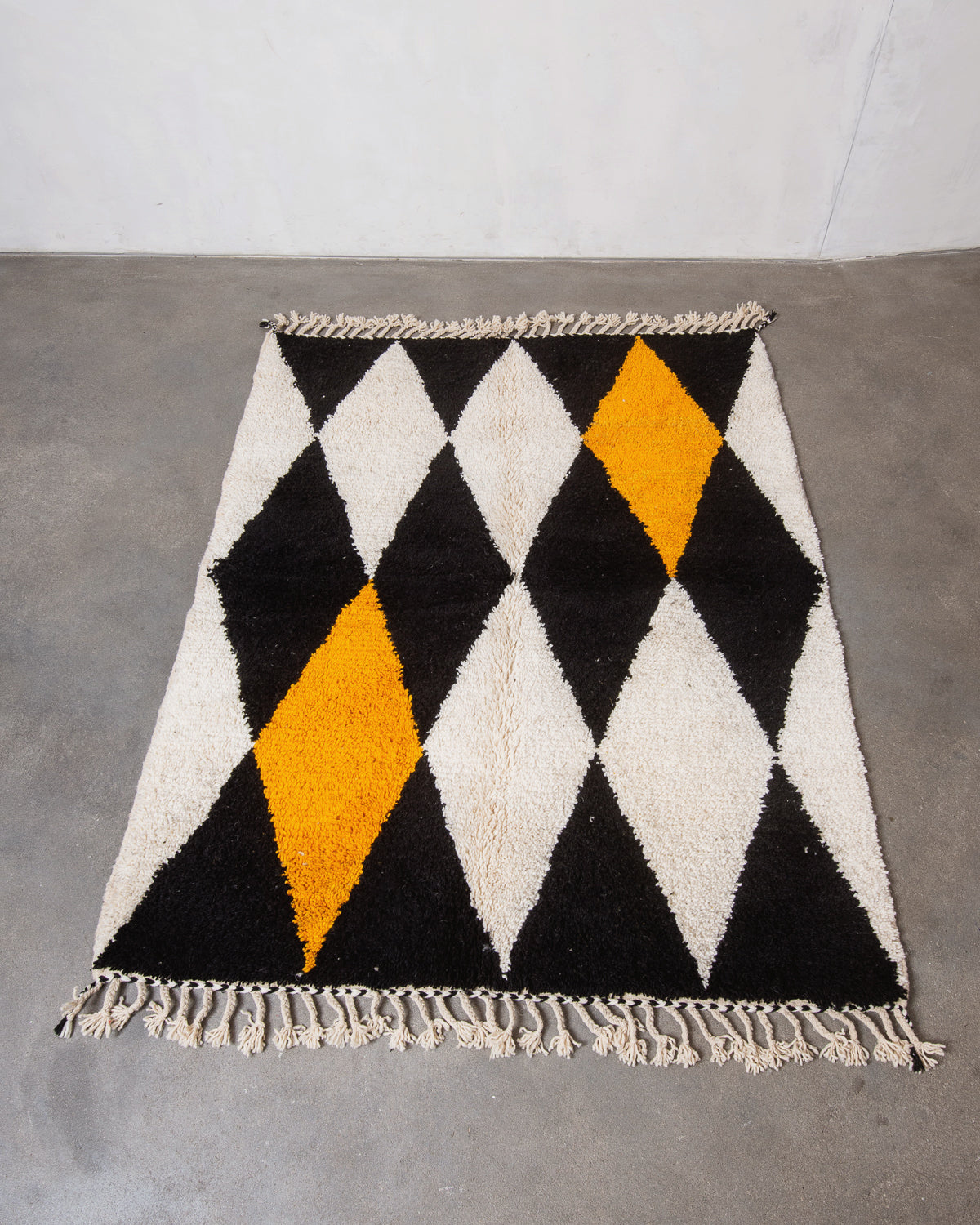 Modern, designer, handcrafted Berber rug from Morocco. Beniourain carpet with beautiful colours and patterns and fluffy wool texture.